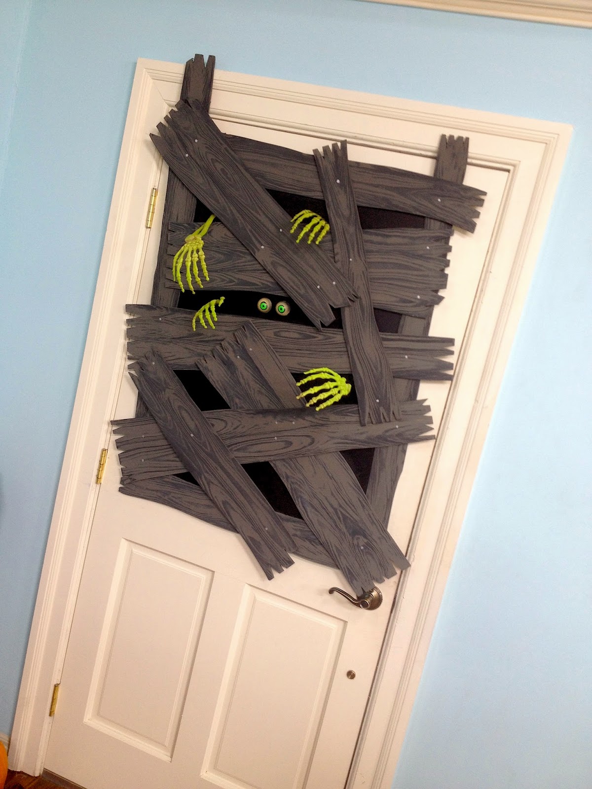 50 Best Halloween Door Decorations For 2018   07 Zombie Windows DIY Homebnc 