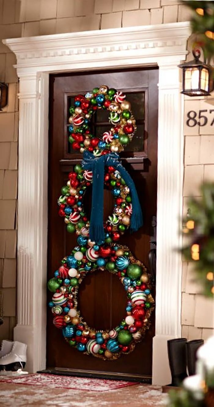 A Snowman Silhouette Made Of Wreaths