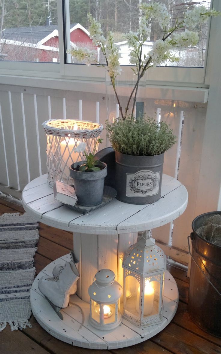 Antique White Pieces Show Off a Potted Herb Garden Beautifully