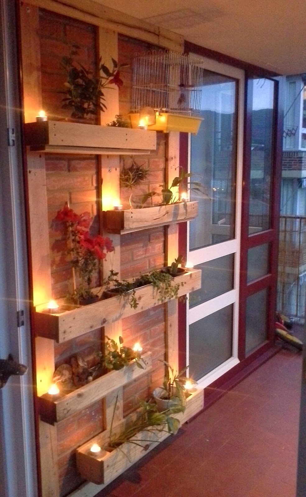 The Subtle Glow of Candles Lights Up These Wood Plant Holders