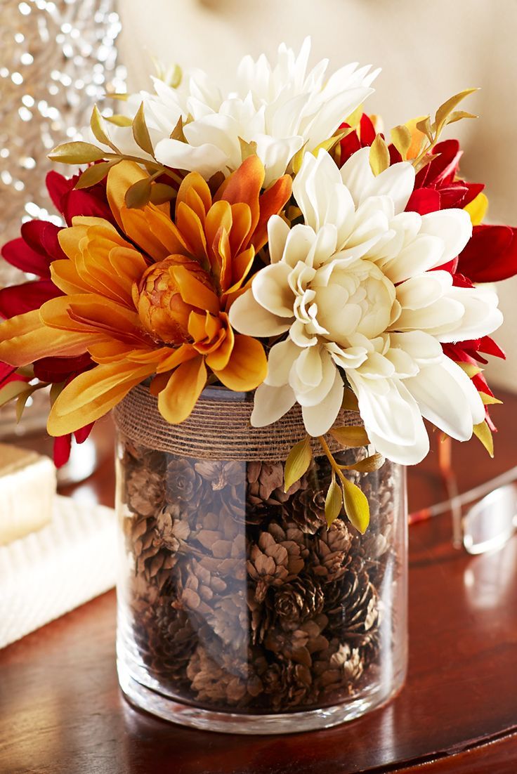 Fall Centerpiece Idea: Fall Blooms in a Pinecone-Filled Vase