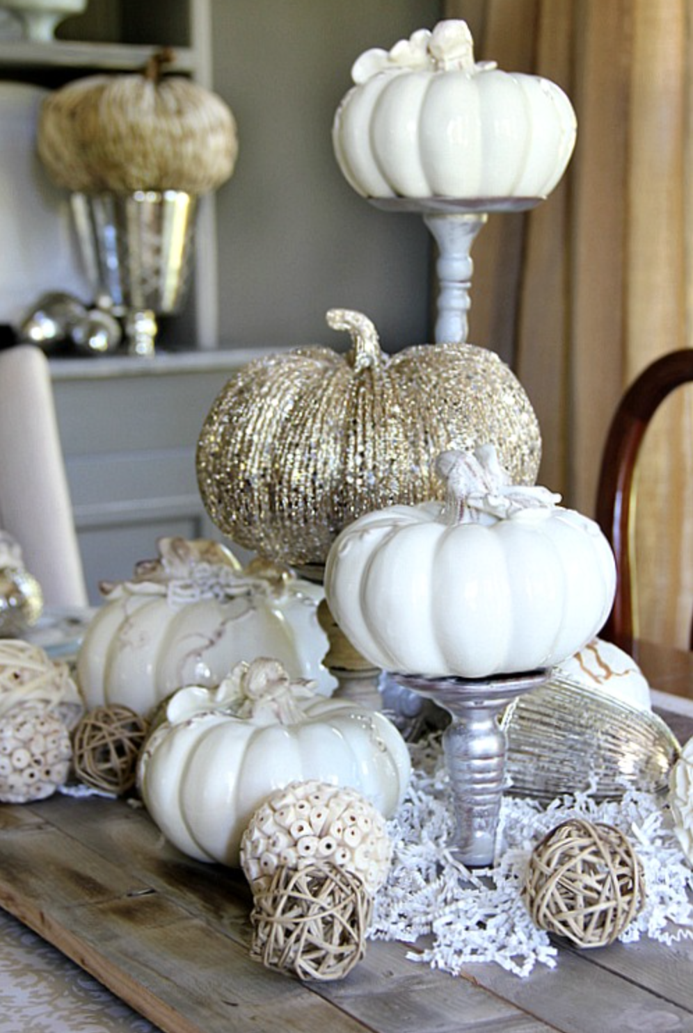 Fall Centerpieces Idea: Ceramic Pumpkin Display with Mismatched Candlestick Risers Fall Centerpieces