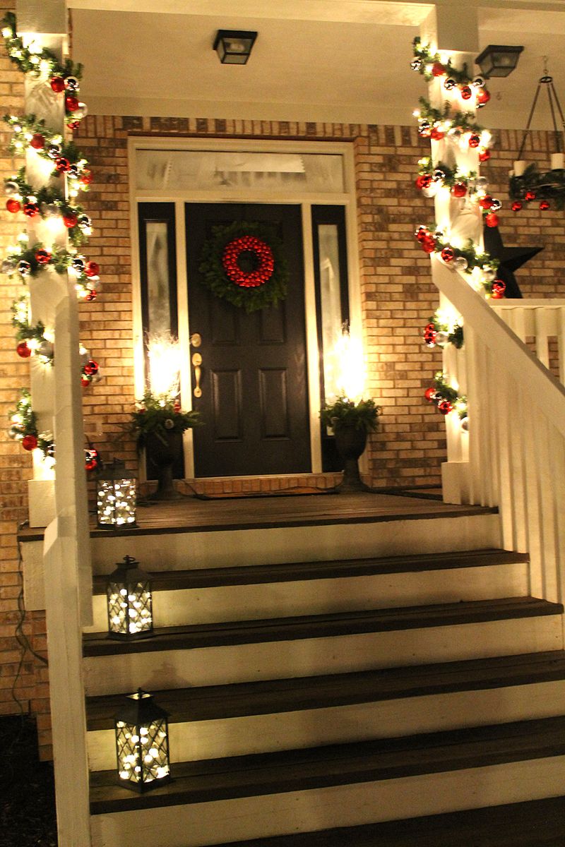 Wrapped Pillars with Lantern-Lit Steps