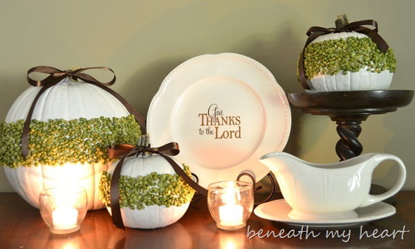 White Pumpkins with Moss Accents, White Accessories, and Candle