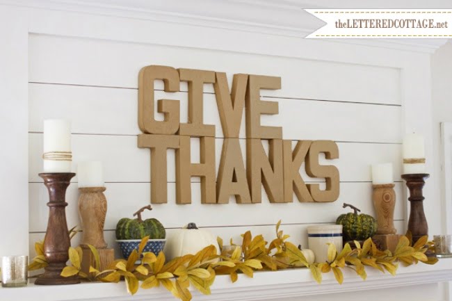 Neutral Mantel Decor with Golden Fall Leaves and Pumpkins