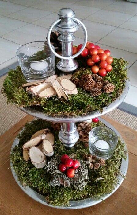 Earthy Votive Display With Berries And Pinecones