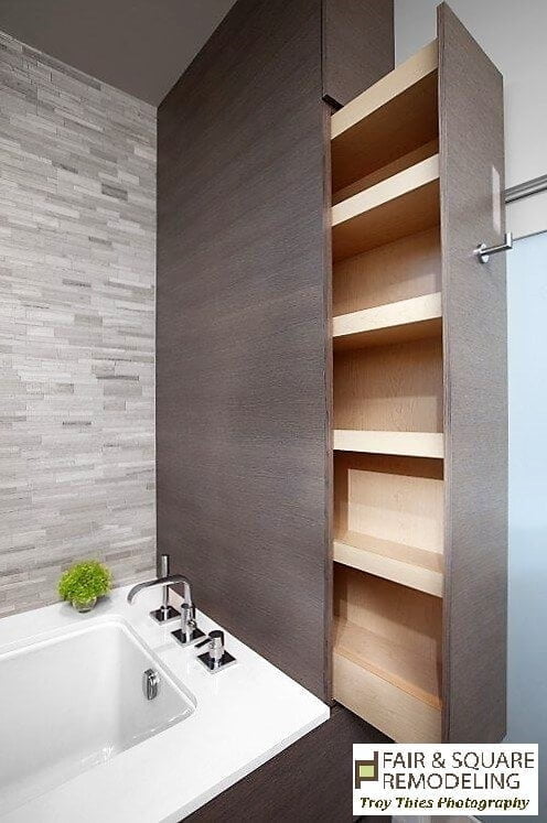 Hidden Sliding Shelf in a Small Bathroom