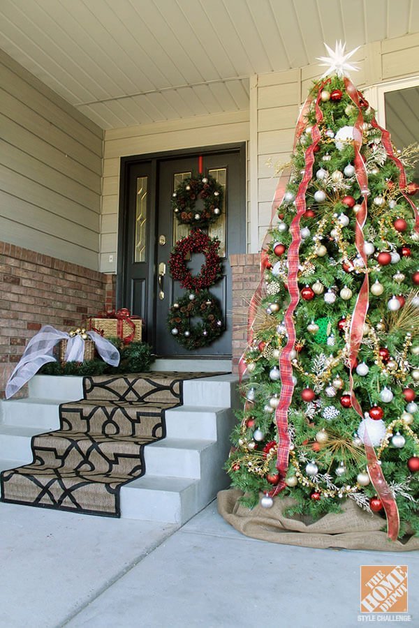 Christmas Trees And Decorations In Front Of A Flat Screen Tv