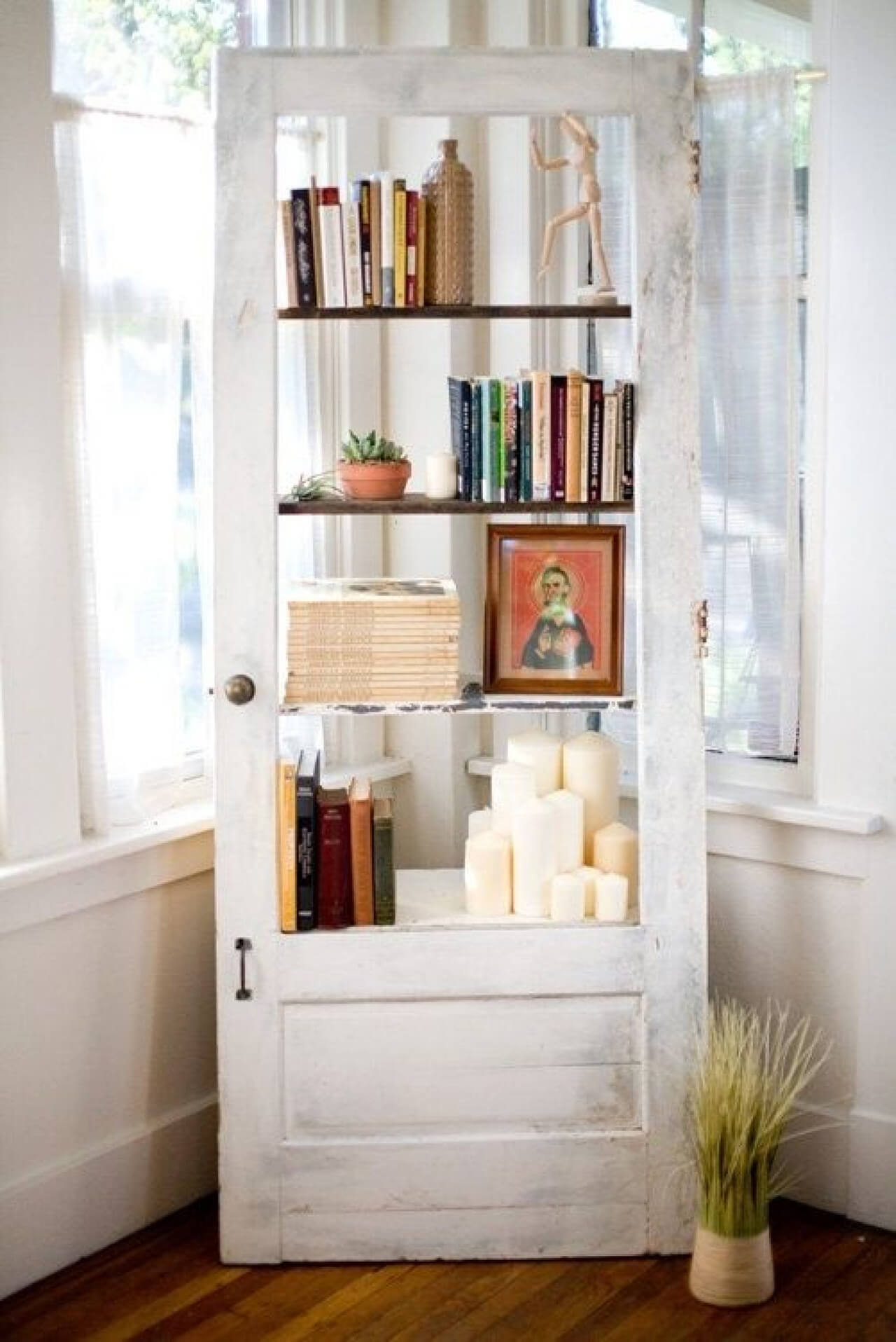 Repurposed Old Door Become Airy Ladder Bookcase