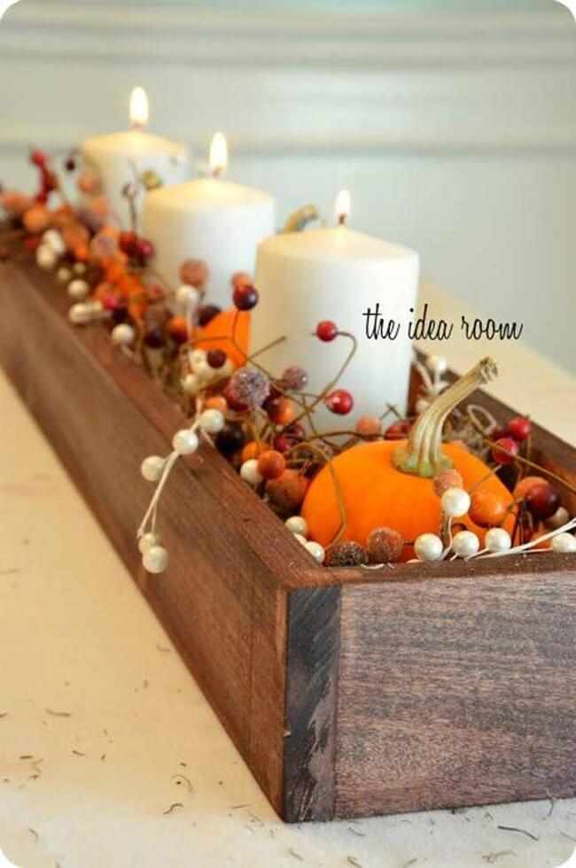 Fall-Inspired Centerpiece with Bright Orange Pumpkins