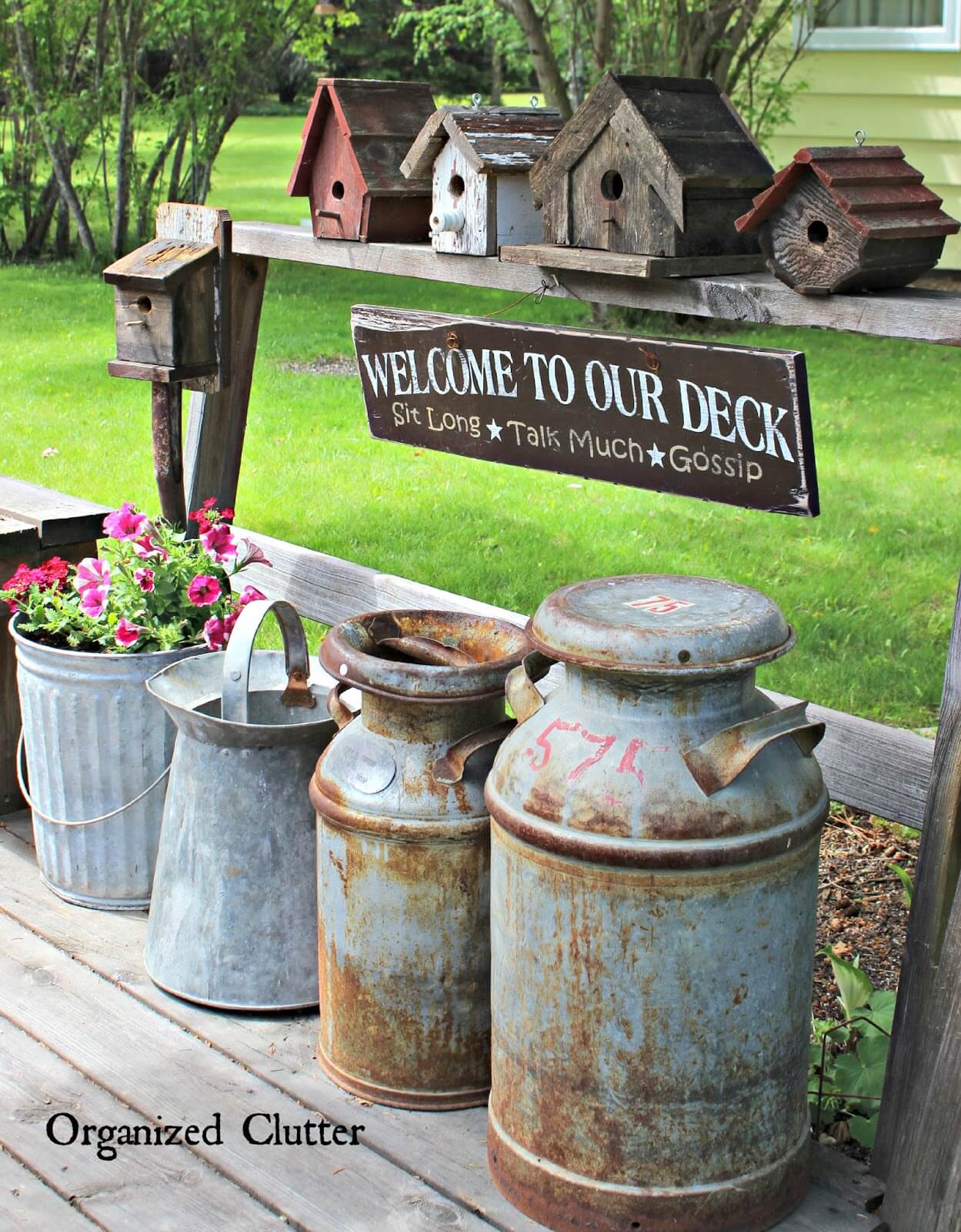 Vintage vogelhuisje en melkkan decoratie-idee