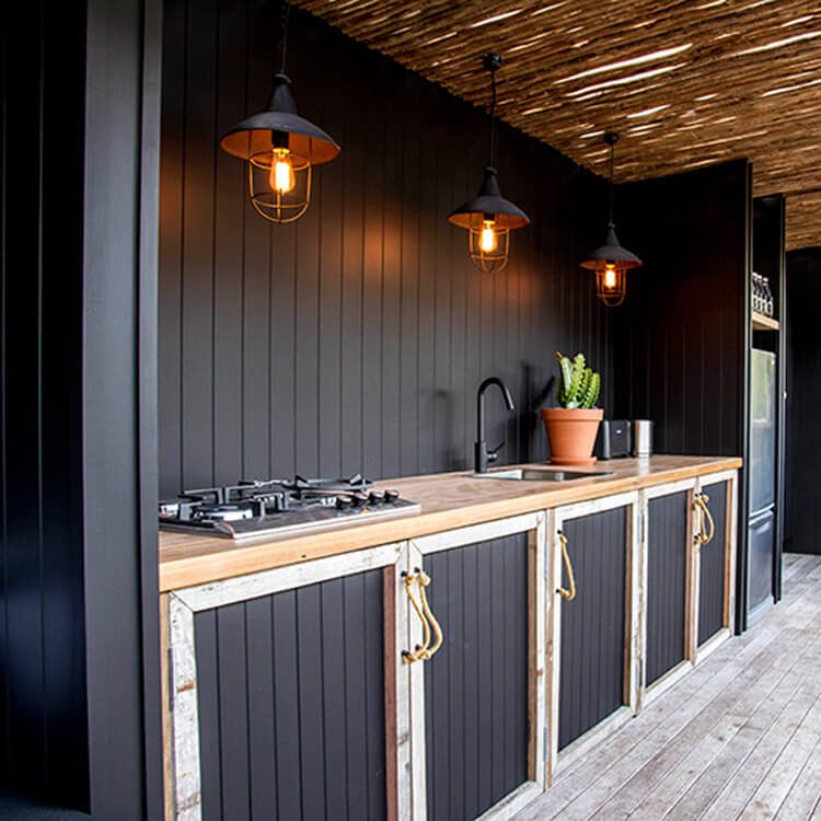 Country Chic Outdoor Kitchen with Cupboards