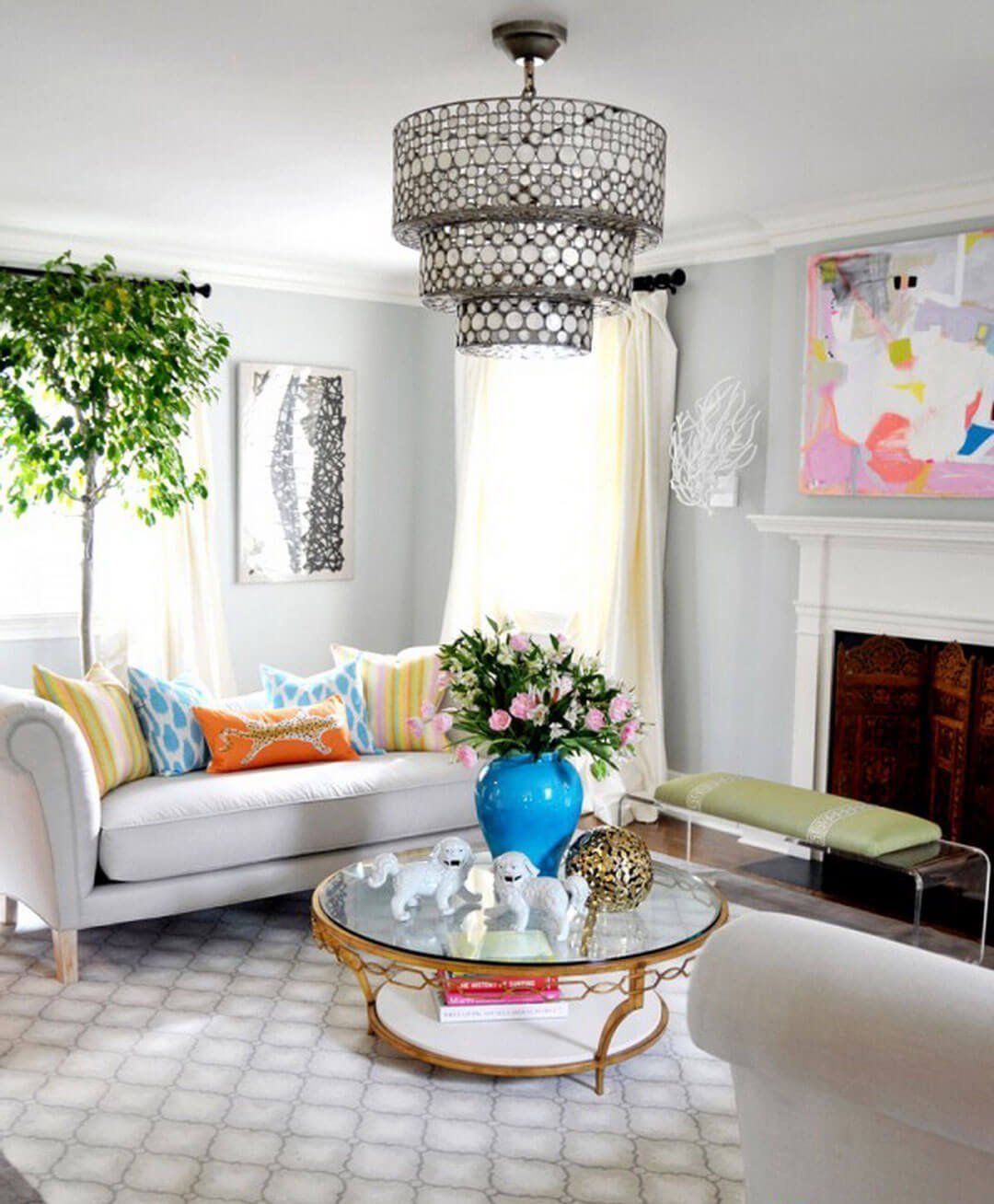 Oriental-inspired Round Table with Chinese Lion Statuettes and Focal Vase