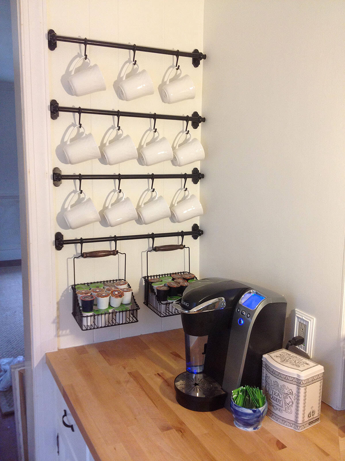 Wall-mounted Pipes with Mug Hooks and Storage Caddies