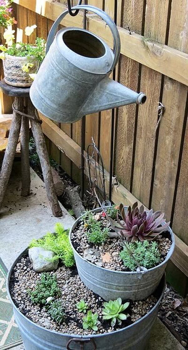 Watering the Succulent Bucket Tower