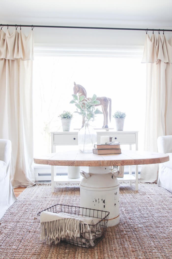 Wooden Table with Painted Milk Jug Base