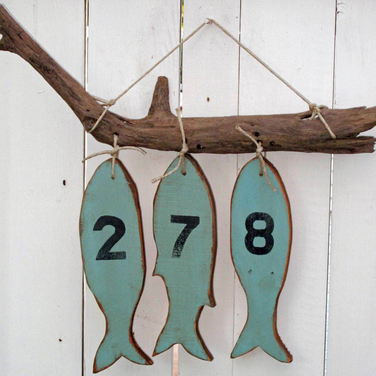 Rustic Branch with a Hanging Fish Display