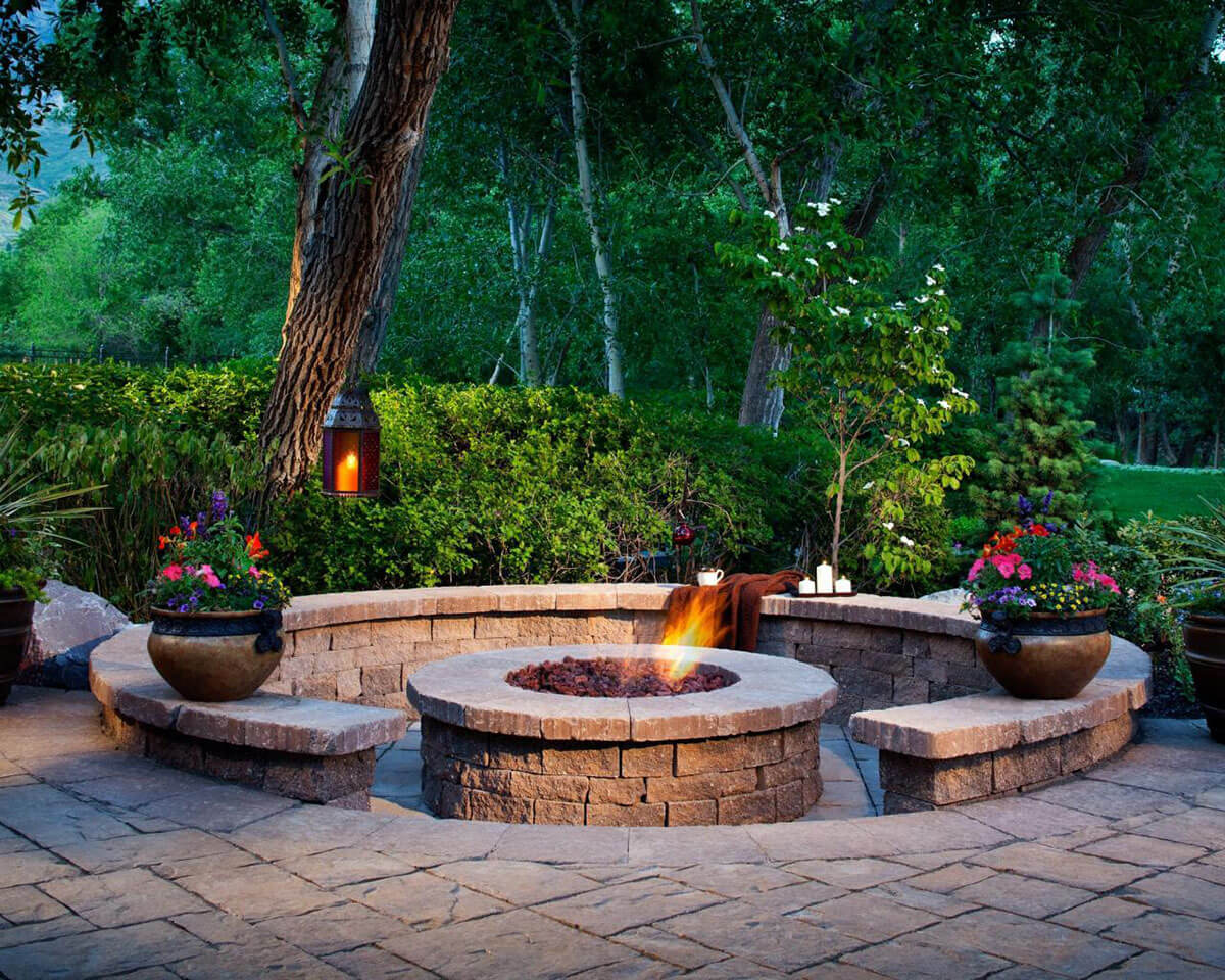 A Firepit Enhanced by Shrubs and Flowers