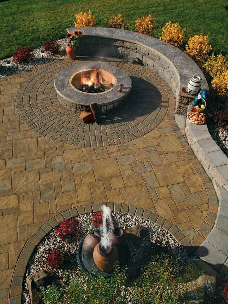 Firepit Alongside a Beautiful Garden Wall