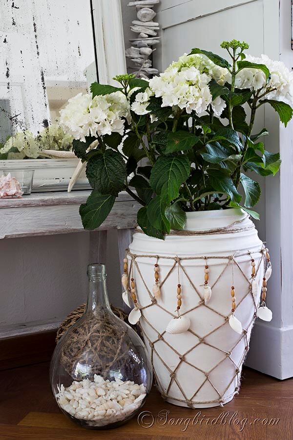 A Decorative Planter Rope with Dangling Shells