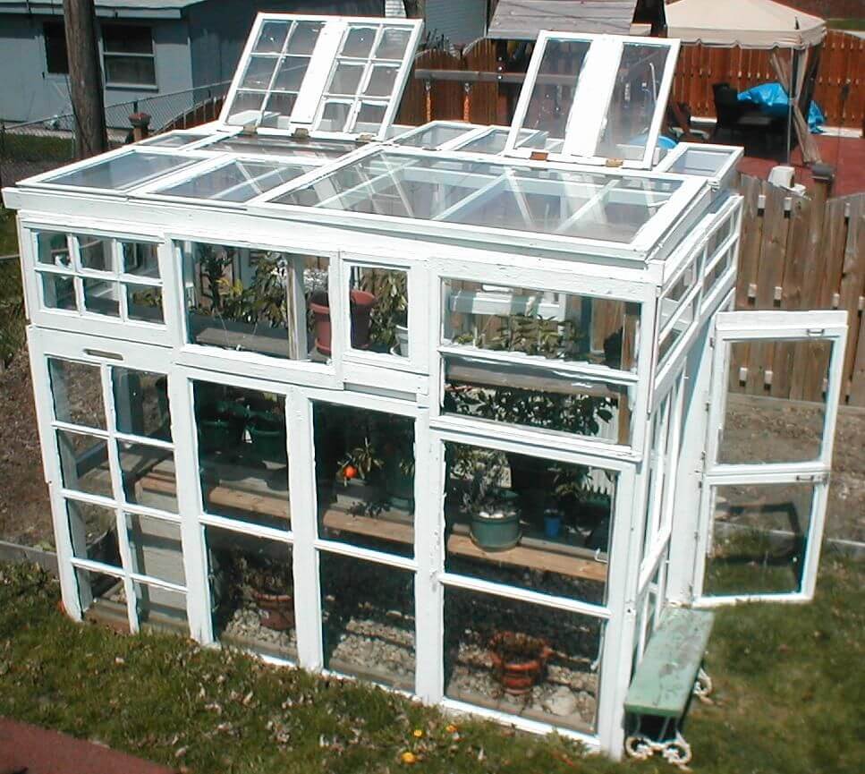 White Framed Green House with Many Stories