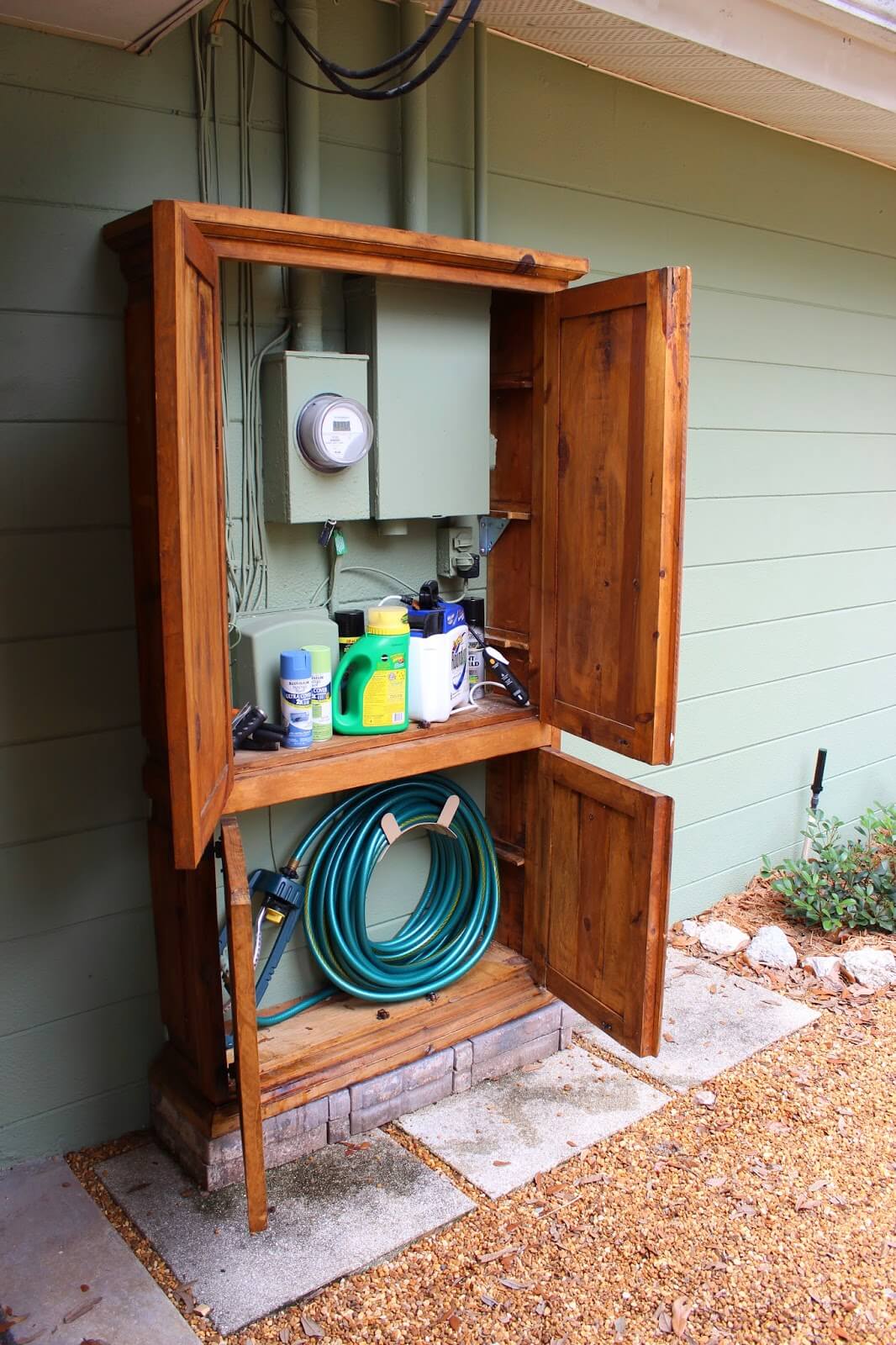 Lovely Cabinet Hides Utility Box and Garden Tools