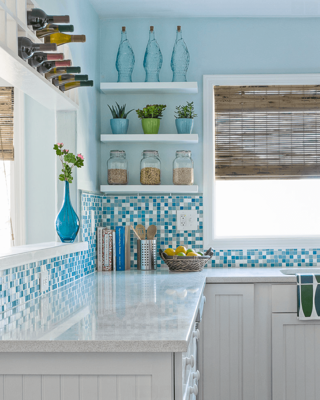 Pretty Blue Tile and Glass Compliments an Airy Kitchen