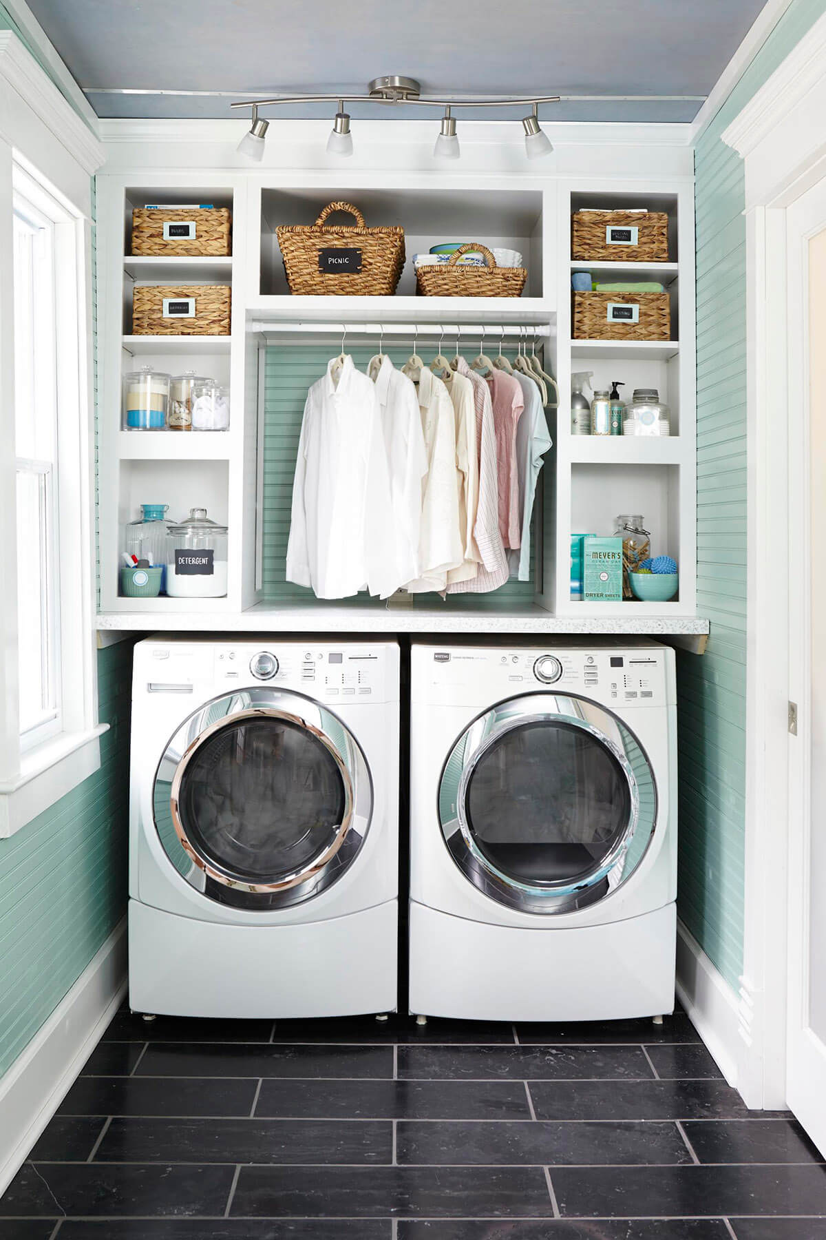 Custom Shelves and Hanging Space Maximize this Laundry Nook
