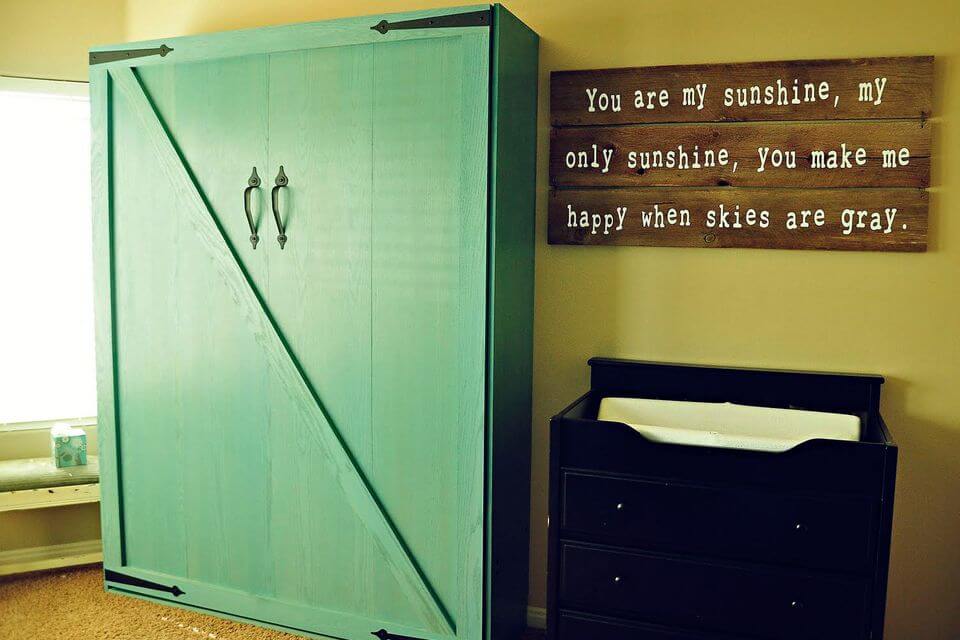 Green Storage Cabinets with a Bed Inside