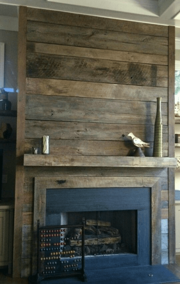 Recycled Farmhouse Wood Creates Unique Fireplace