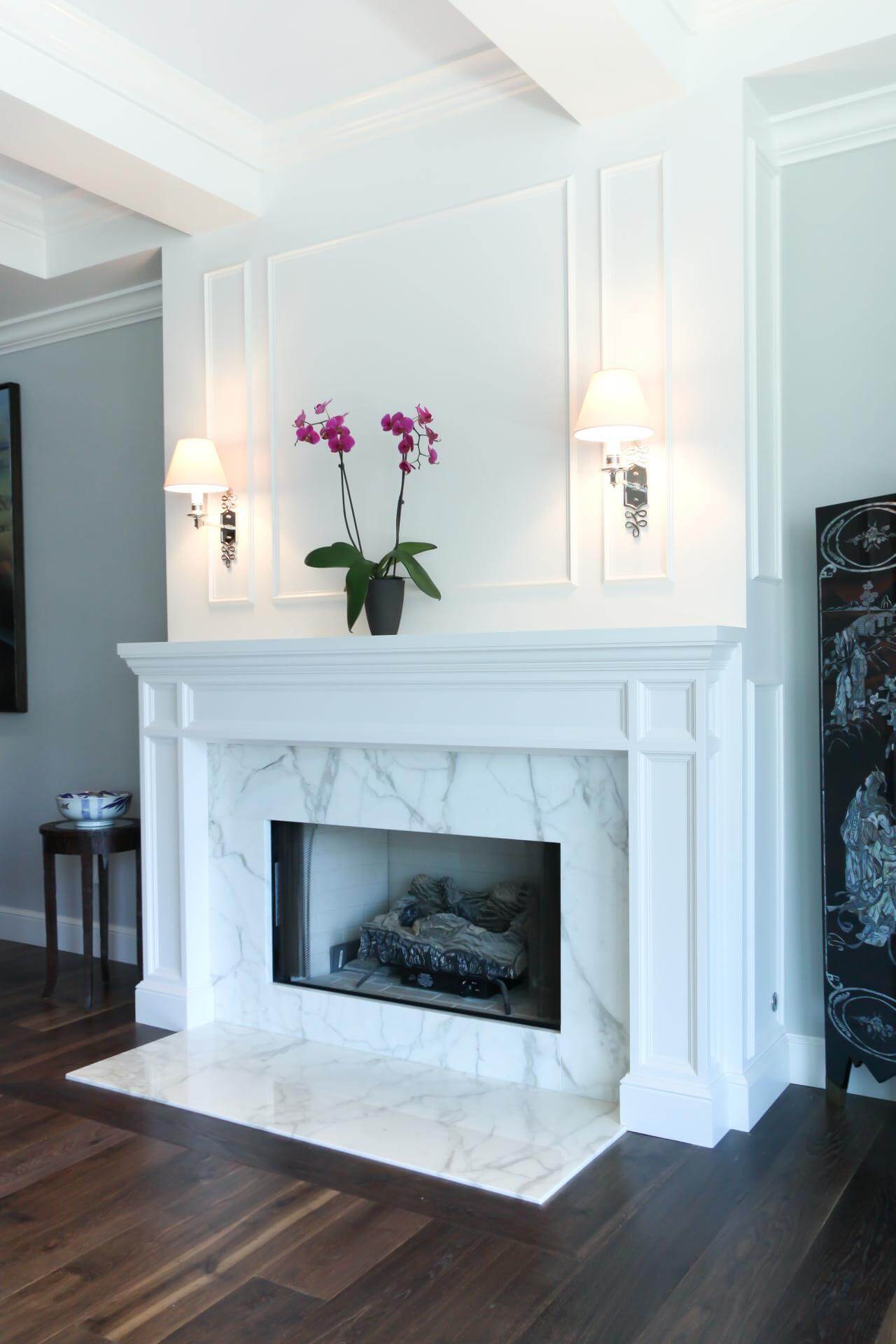 Classic White Paneling with Marble Surround