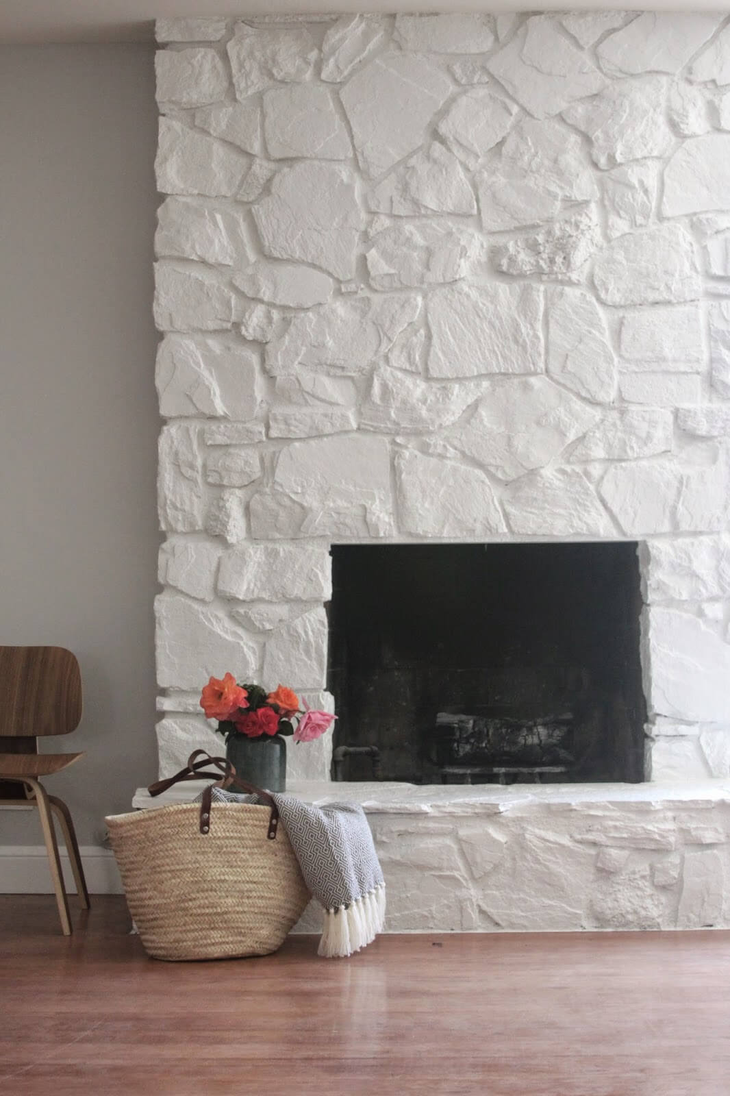 Painted Stone Creates Simple White Fireplace