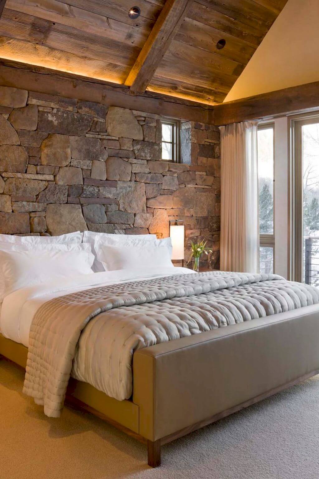 Rustic Exposed Beam and Quarry Stone Bedroom