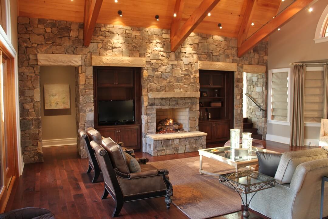 living room with stone walls