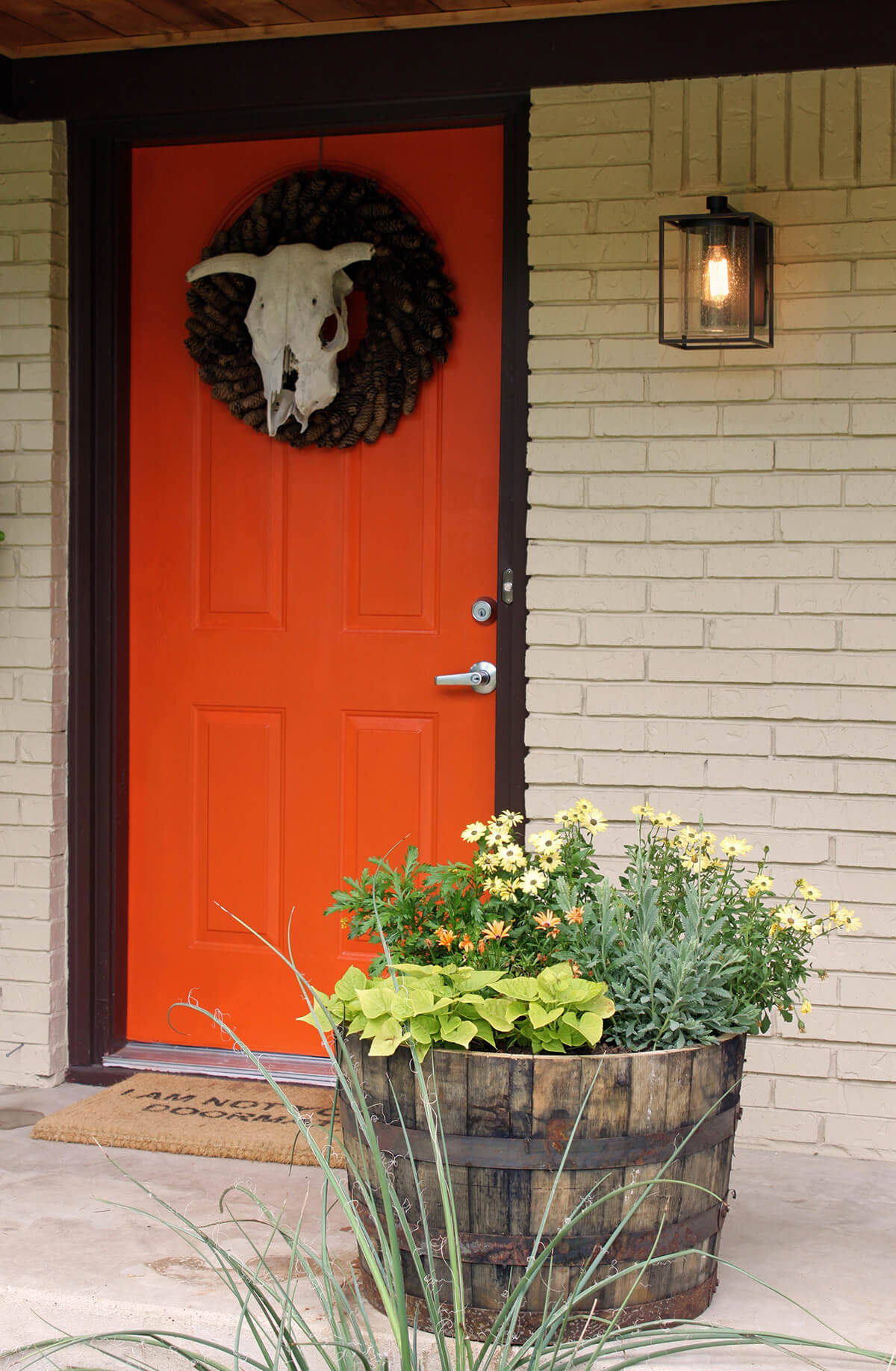 Orange with a Pine Cone Wreath