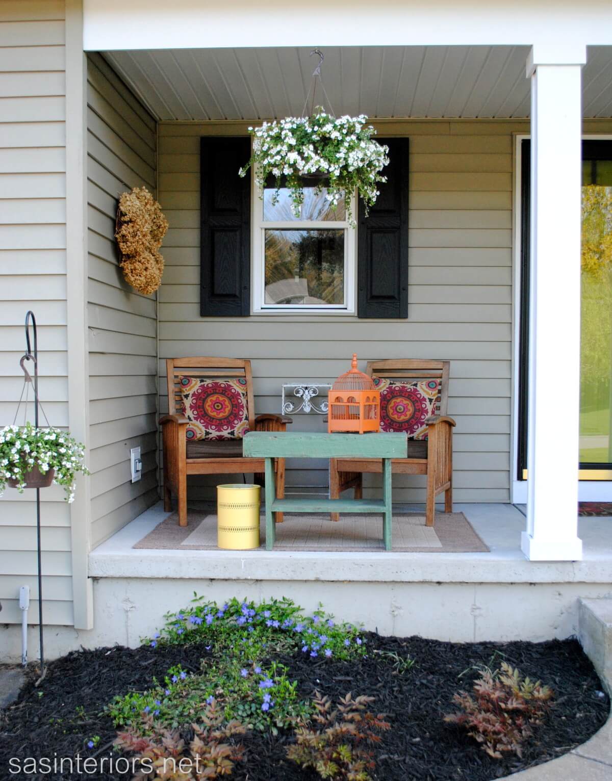 Wooden Chairs and Table With Colorful Pillows