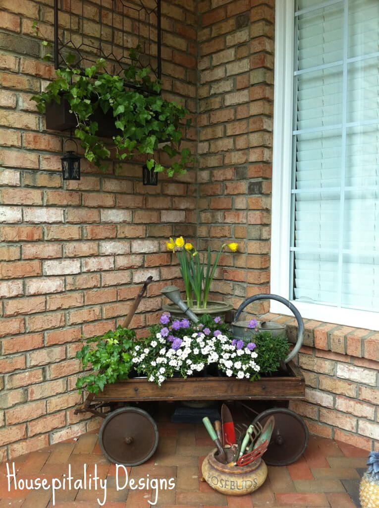 Antique Wagon, Watering Can and Potted Flowers