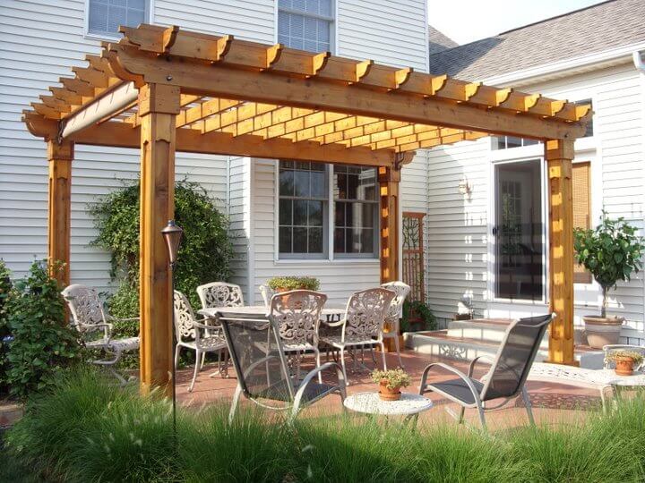 Lovely Arbor over Wrought Iron Furniture
