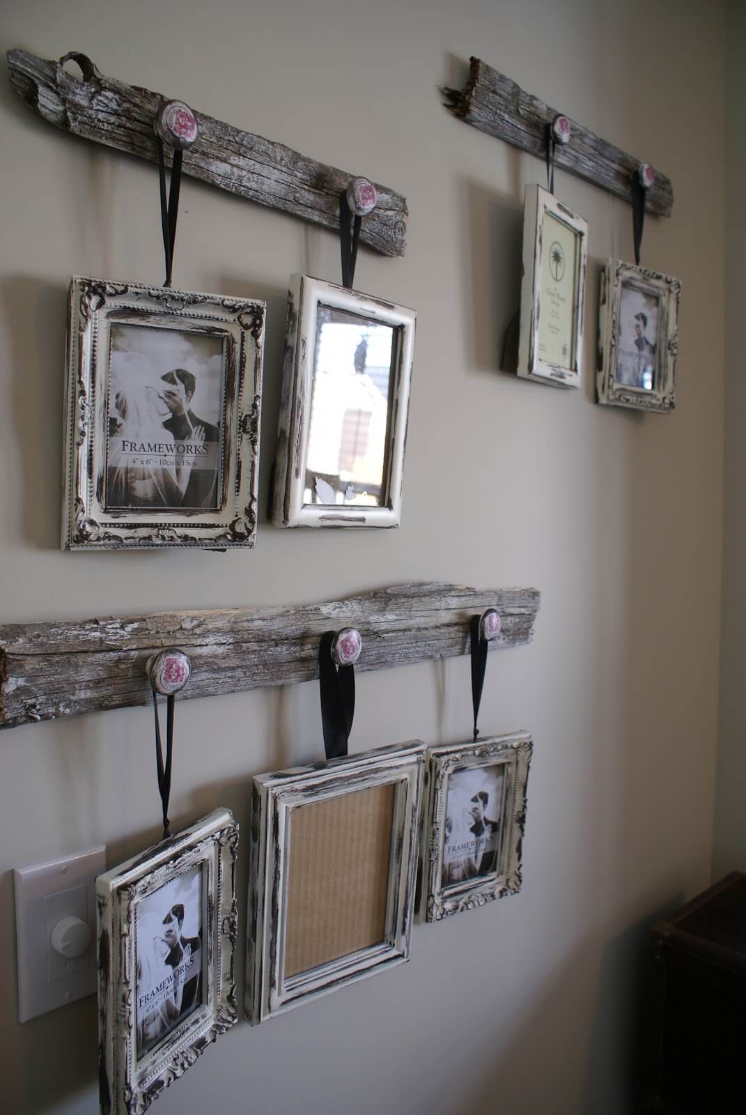Old Fashioned Frames Hung On Reclaimed Wood Boards
