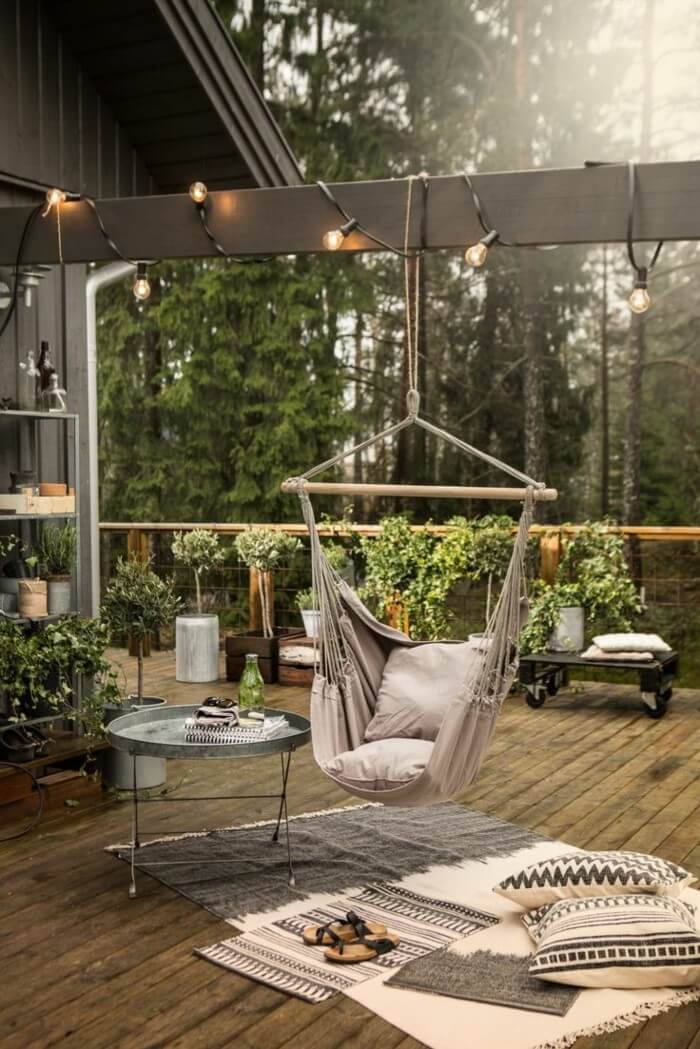 Relaxing Outdoor Living Spaces with a Hammock Swing