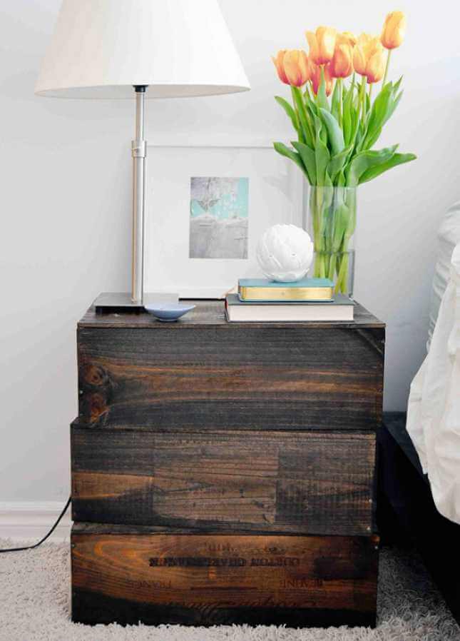 Stacked Stained Wooden Crates as a Bedside Table