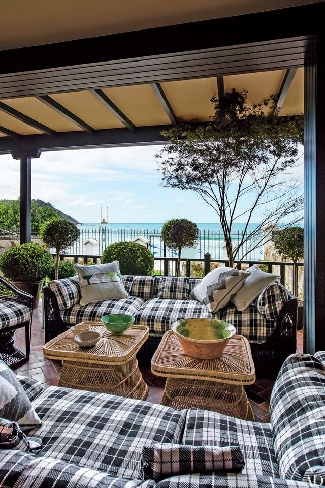 Relaxing Outdoor Living Spaces with Plaid Cushions