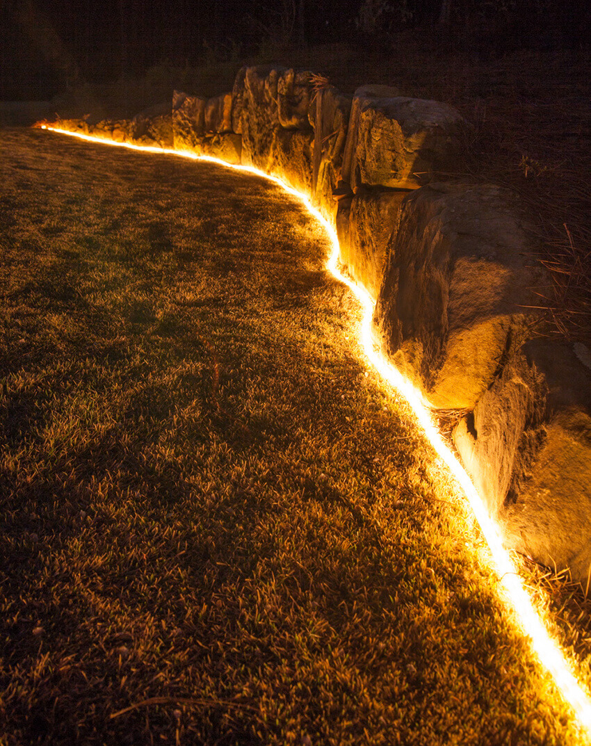 Bright Tube Lighting Along the Rocks