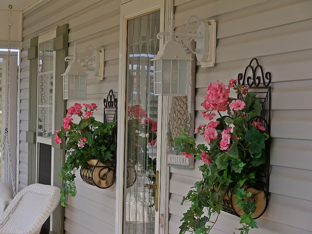 wrought iron wall plant holders