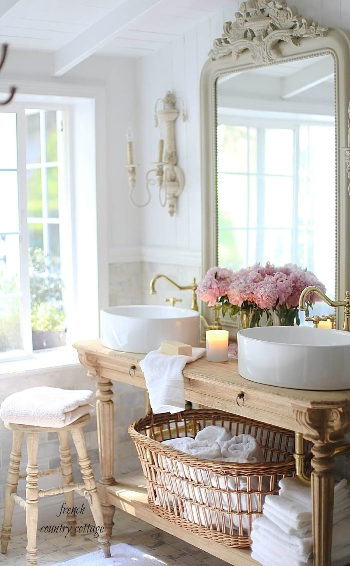 Round Sinks and an Ornate Mirror