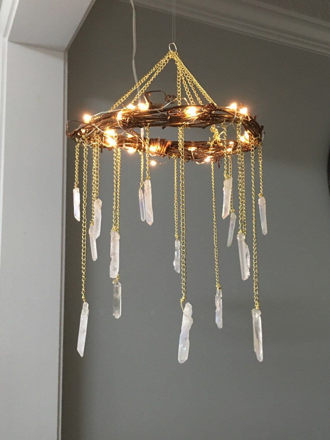 White Stones Dangling from Gold Chandelier