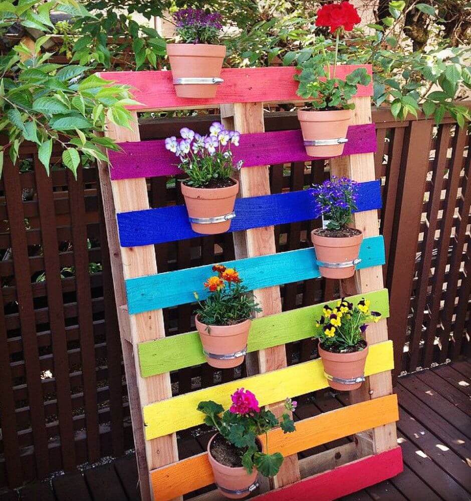 Rainbow-Colored Pallet Hangs Flower Pots