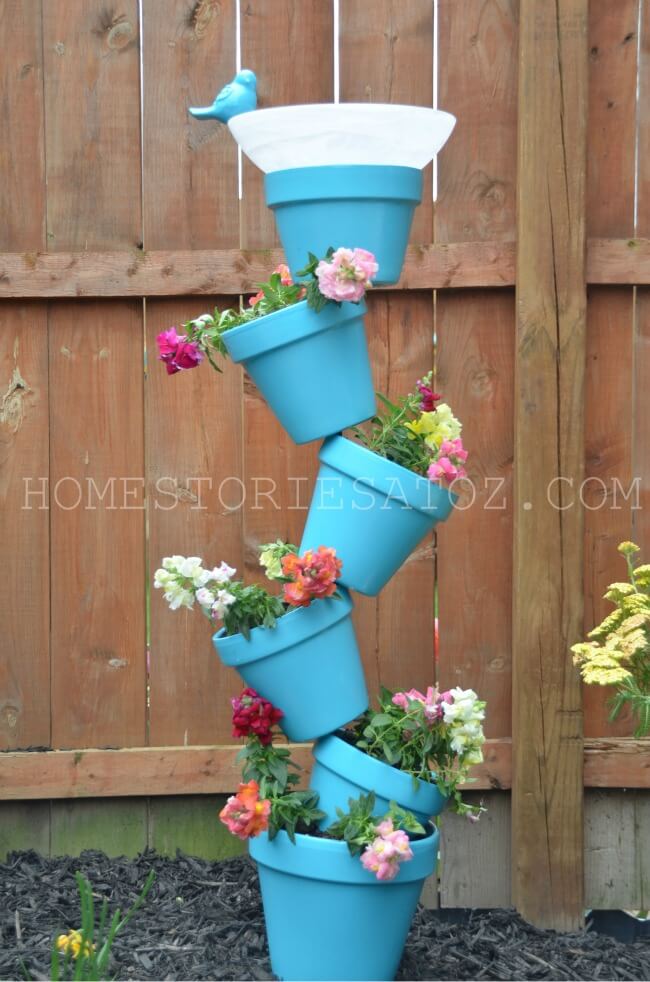 Tilted Flower Pot Arrangement with Bird Bath