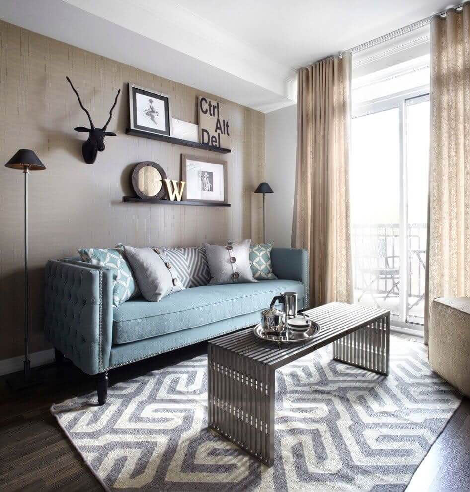 Calming Blue Sofa and Geometric Rug