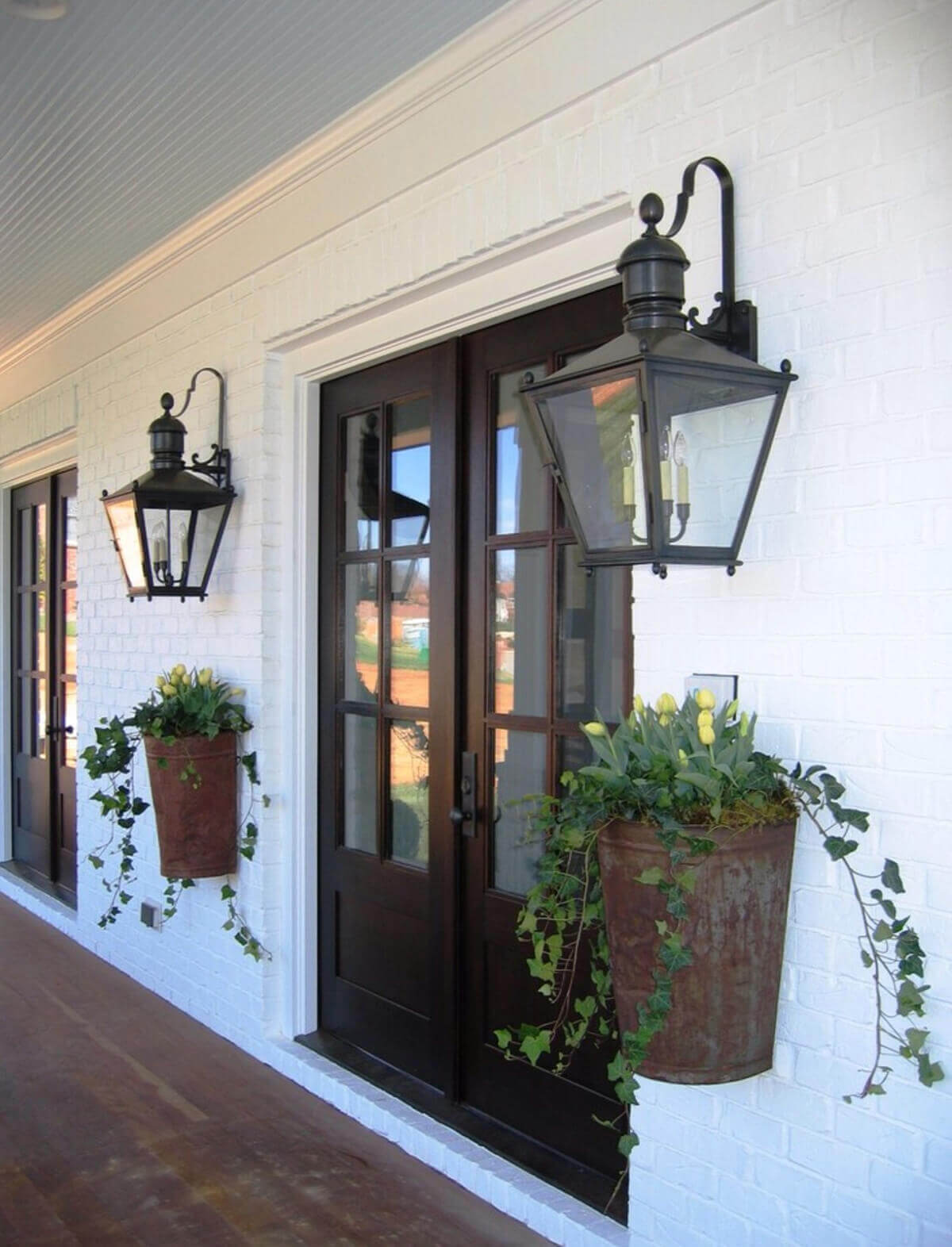 Rusty Metal Planters by the Door